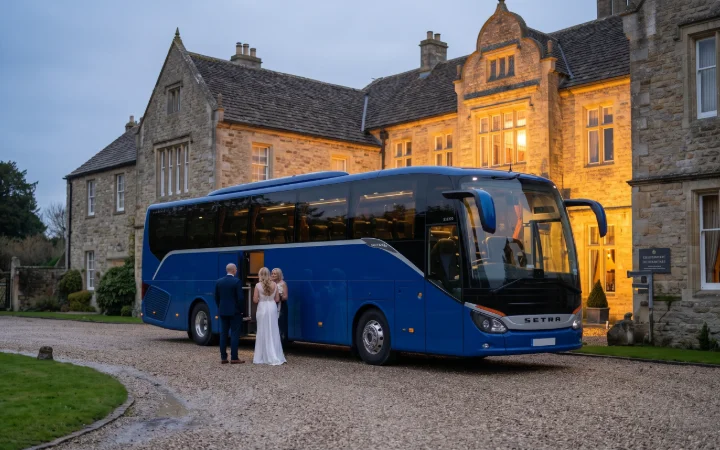 Coach at a venue in the evening